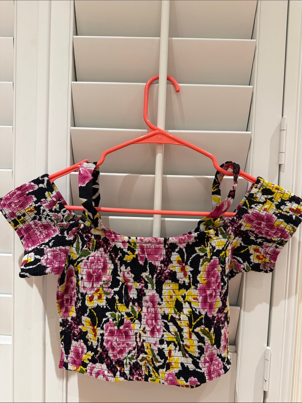 American Rag Pink Floral Smocked Off-Shoulder Crop Top on Black - Picture 2 of 3